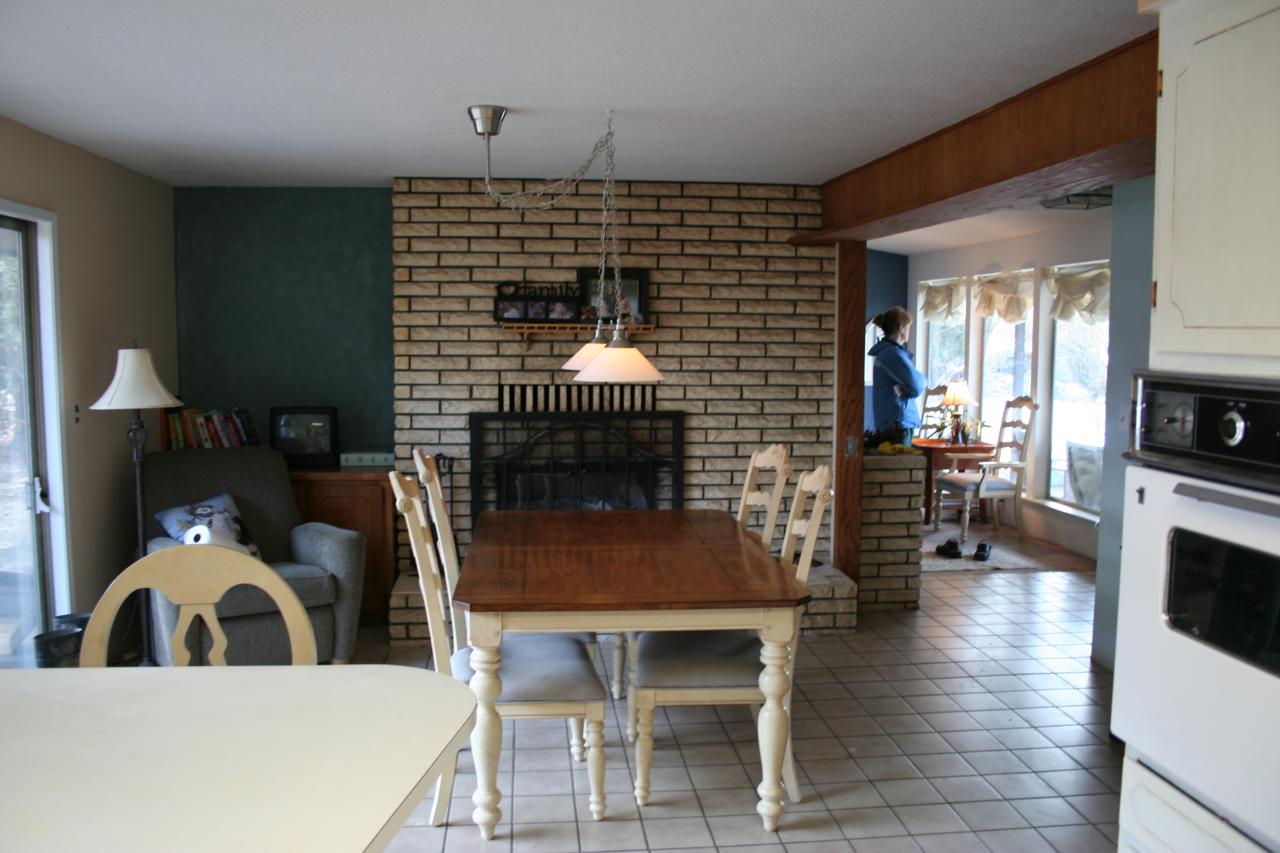 821 Livengood Road Cowiche, WA 98923 - Photo 3 of 13 a kitchen with a table chairs and a stove