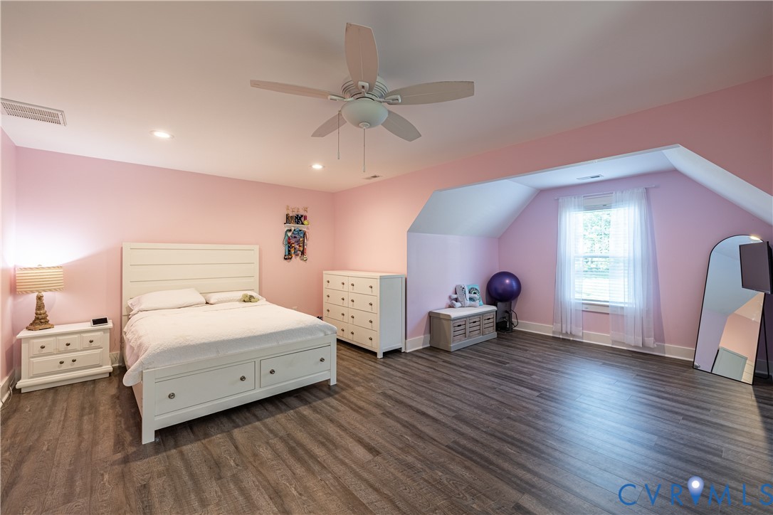 1471 Yakima Road Quinton, VA 23141 - Photo 22 of 39 Bedroom featuring wood finished floors, lofted cei