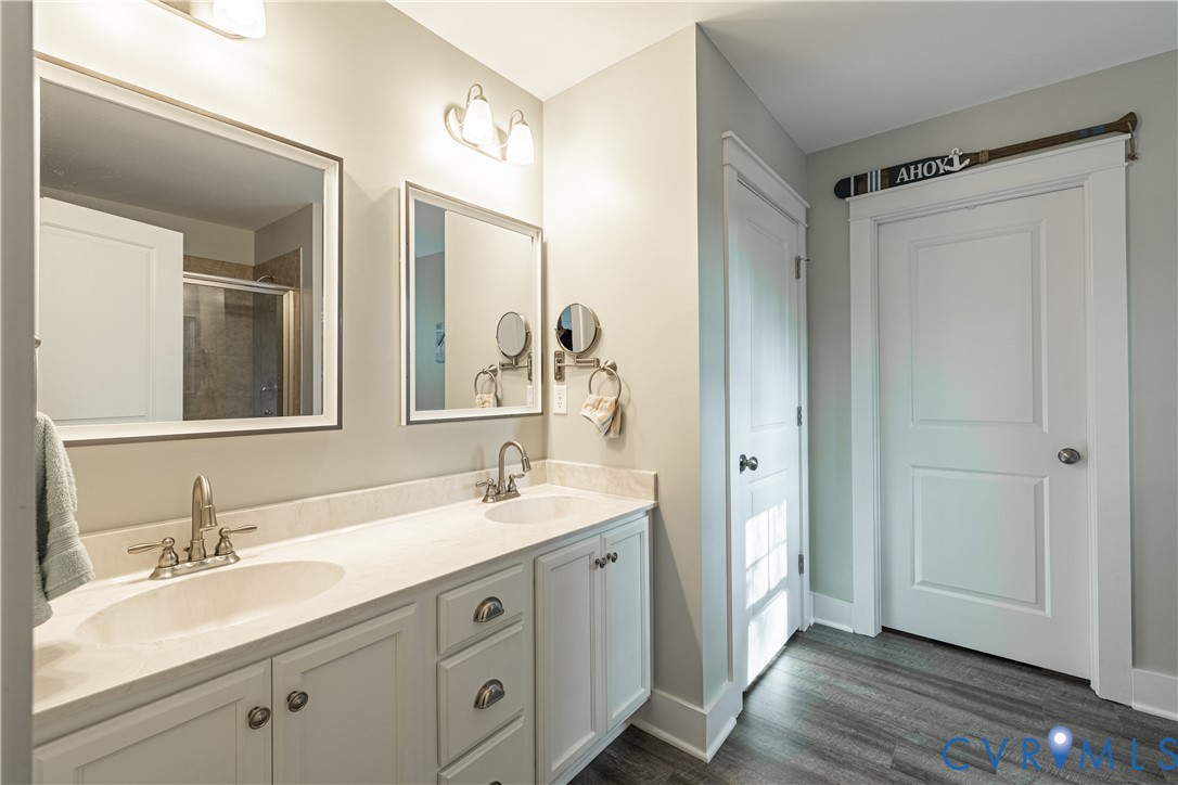1471 Yakima Road Quinton, VA 23141 - Photo 27 of 39 Bathroom featuring double vanity, wood finished fl