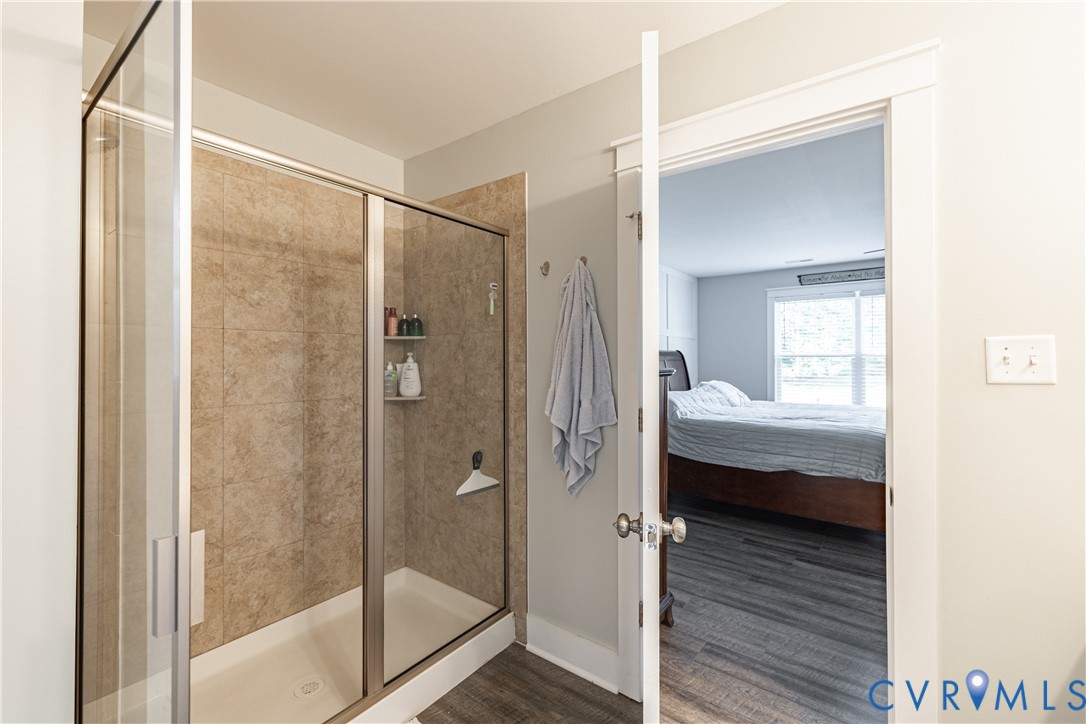 1471 Yakima Road Quinton, VA 23141 - Photo 28 of 39 Ensuite bathroom featuring a shower stall and wood