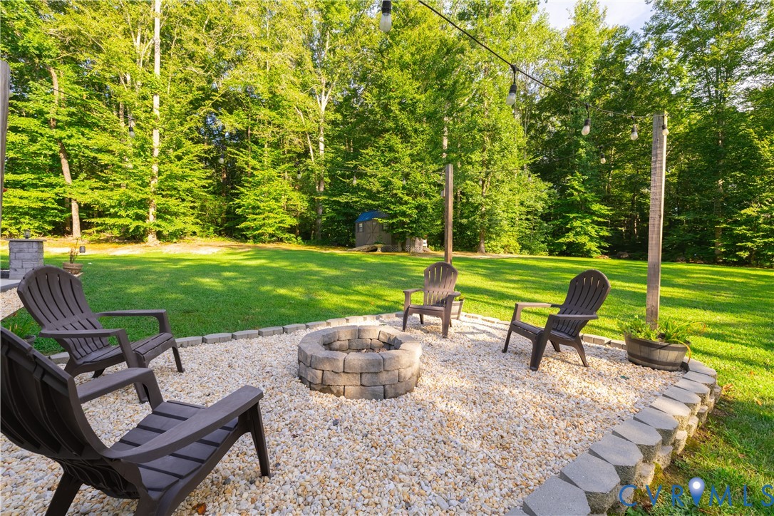 1471 Yakima Road Quinton, VA 23141 - Photo 35 of 39 View of patio / terrace with a fire pit