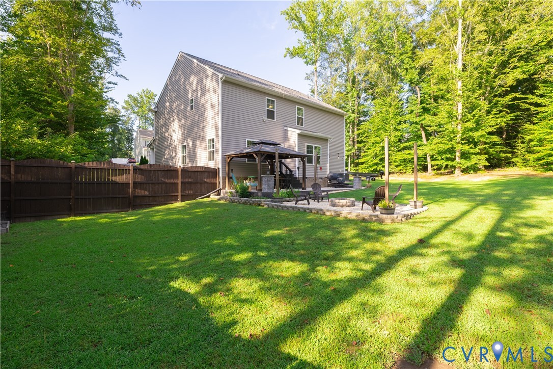 1471 Yakima Road Quinton, VA 23141 - Photo 37 of 39 Rear view of property with a gazebo, a patio area,
