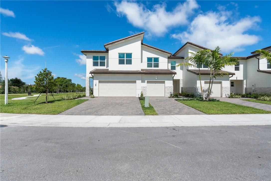 5714 Veranda Way, Unit 2 Boca Raton, FL 33433 - Photo 2 of 24 a house with a outdoor space