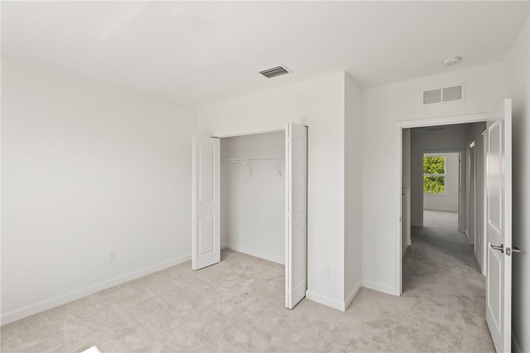 5714 Veranda Way, Unit 2 Boca Raton, FL 33433 - Photo 6 of 24 an empty room with closet
