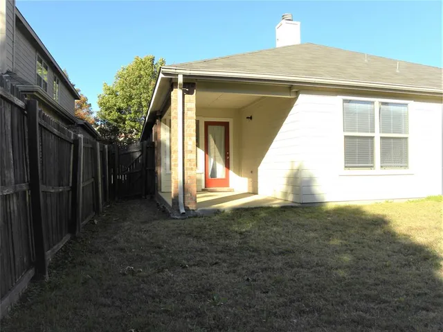 a view of backyard of house