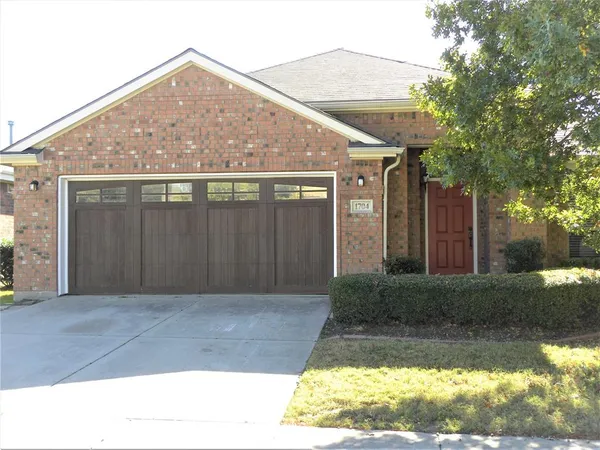 a front view of house with yard
