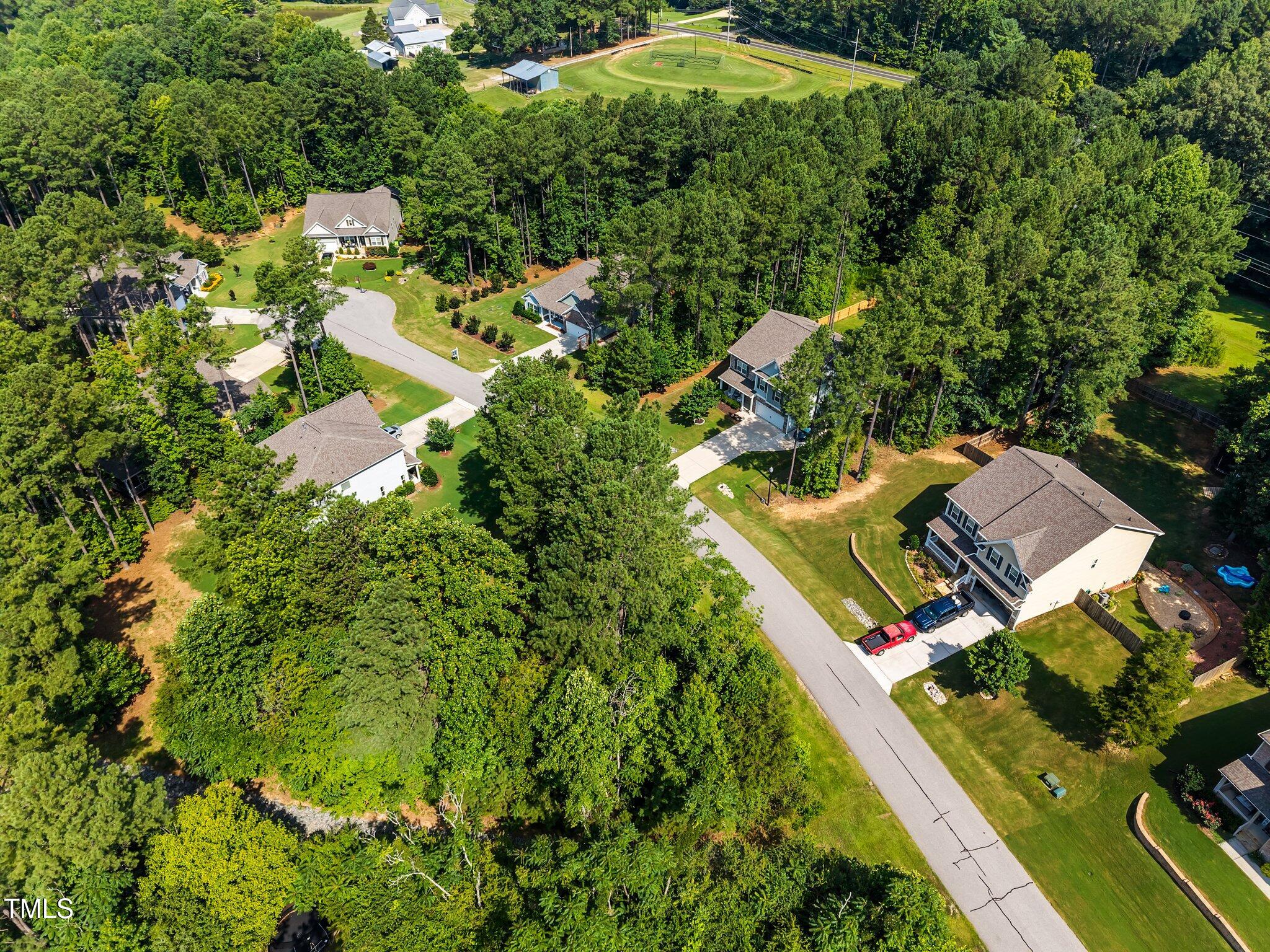 9004 Patmos Way Wake Forest, NC 27587 - Photo 8 of 18 an aerial view of a house with a yard