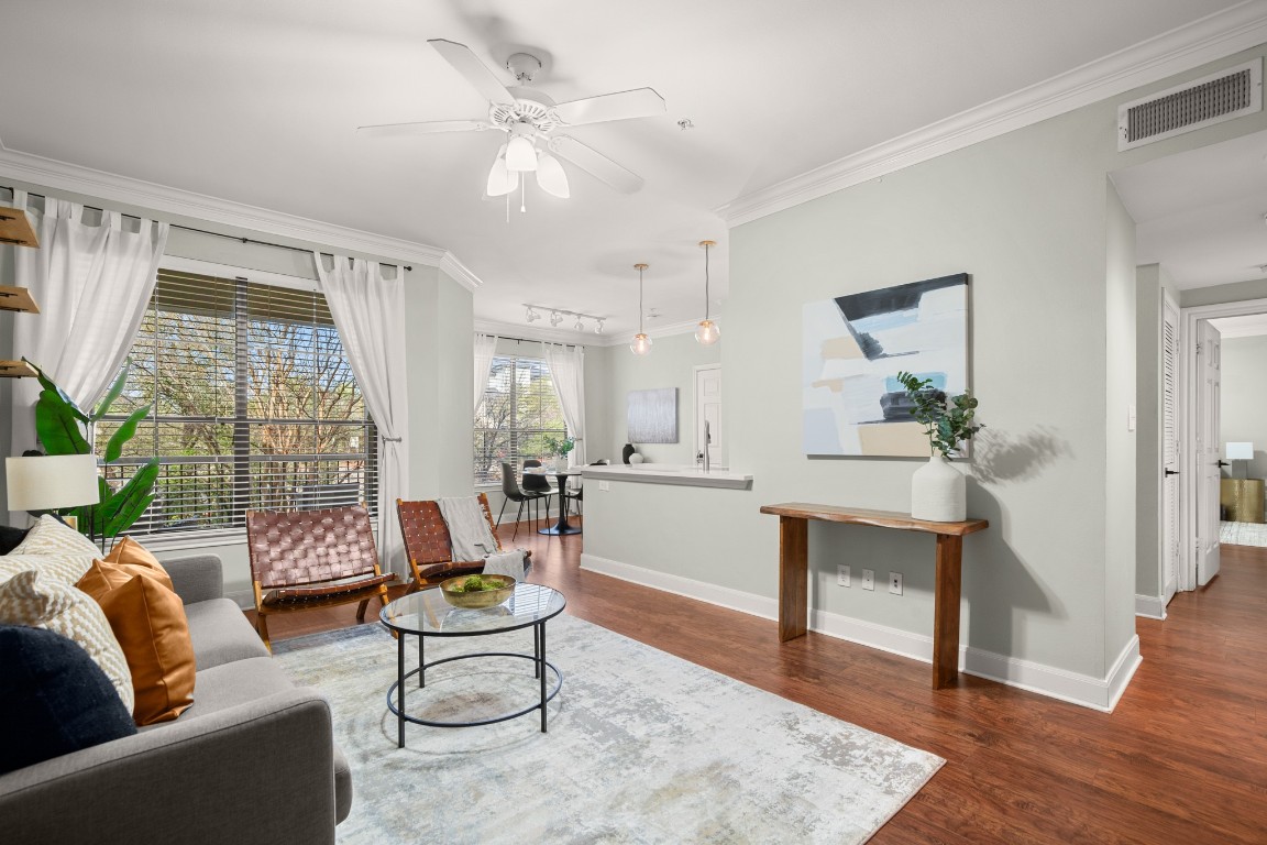 a living room with furniture and a table