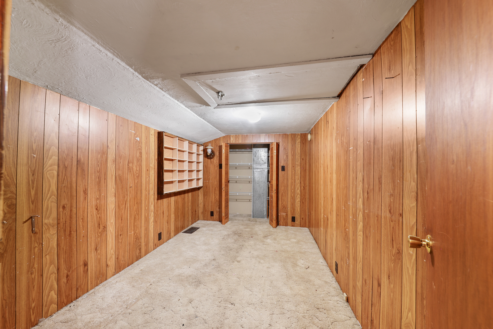 299 East Lincoln Street Seneca, IL 61360 - Photo 11 of 17 a view of a hallway with wooden walls