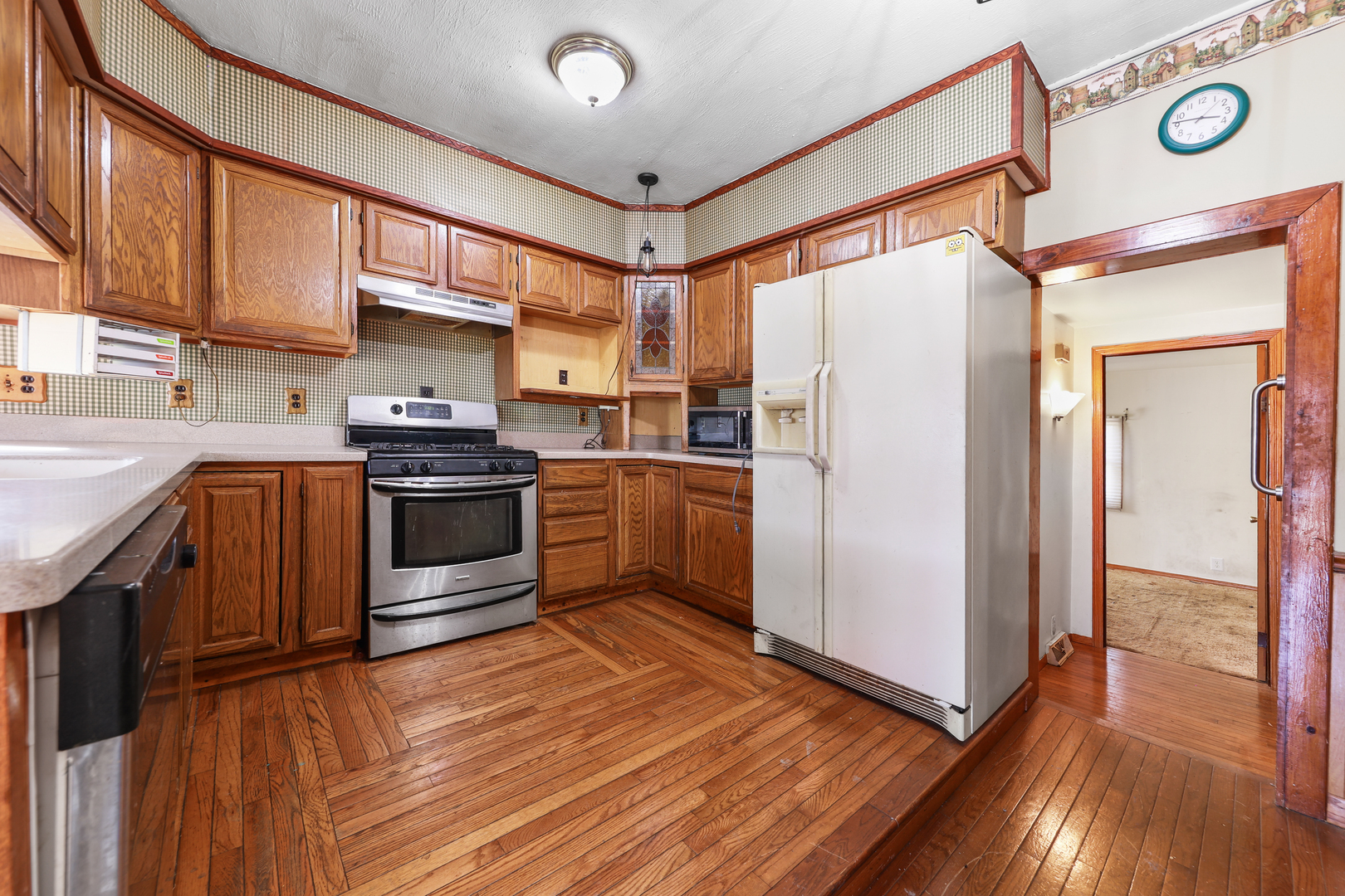 299 East Lincoln Street Seneca, IL 61360 - Photo 3 of 17 a kitchen with stainless steel appliances granite countertop a stove a refrigerator and a sink