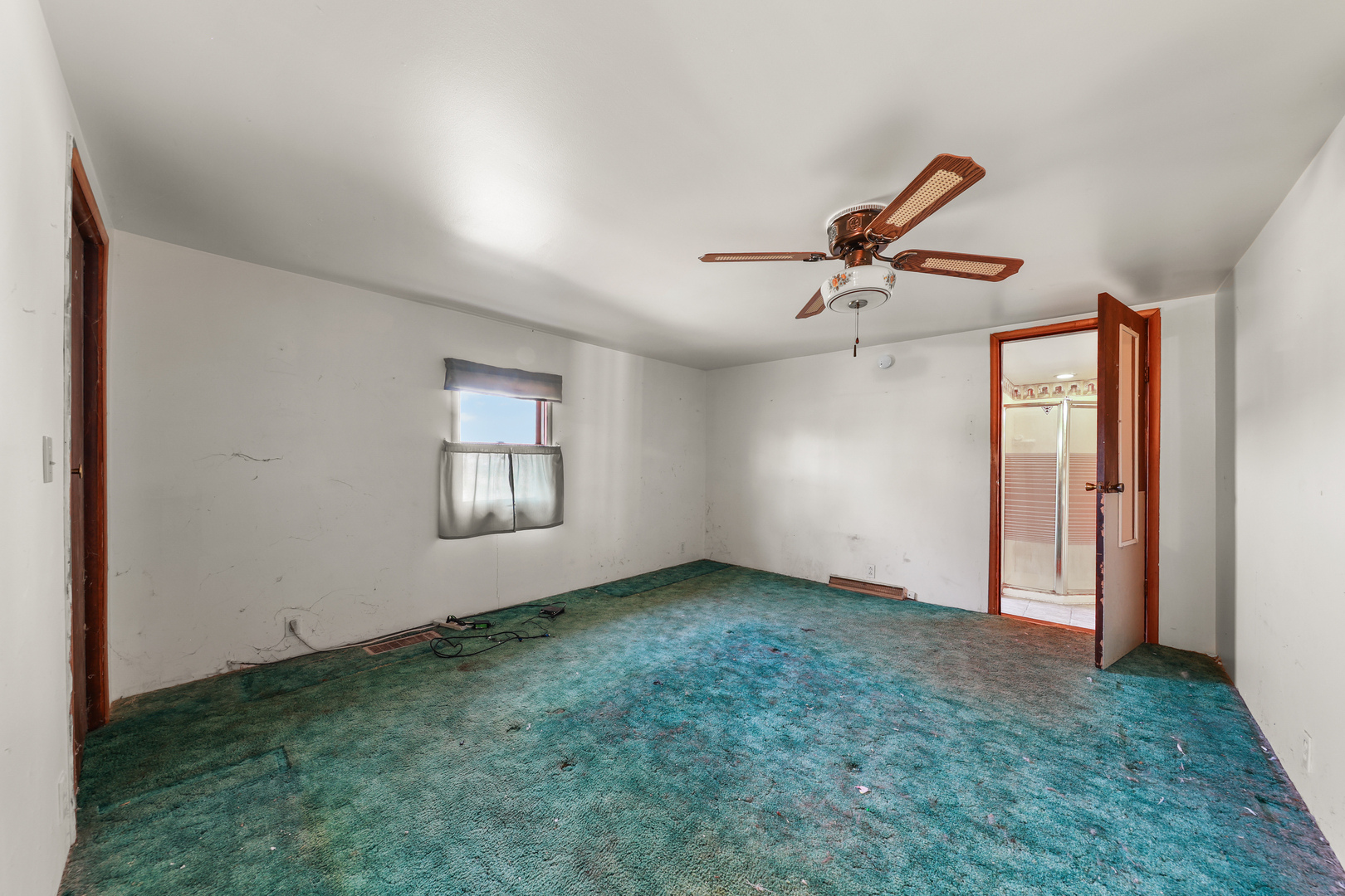 299 East Lincoln Street Seneca, IL 61360 - Photo 8 of 17 a view of room with ceiling fan and window