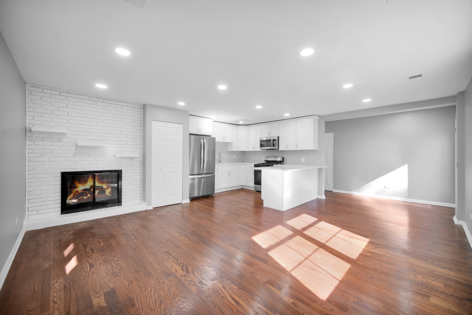 28W360 Roosevelt Road Winfield, IL 60190 - Photo 36 of 50 a view of kitchen with furniture and wooden floor