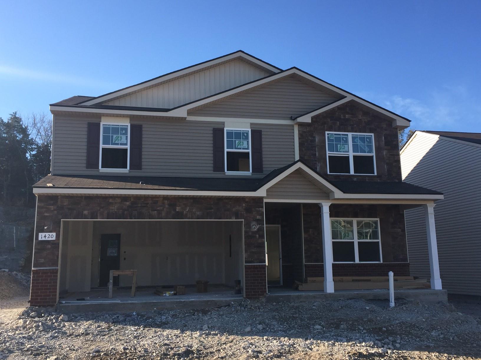 1420 Old Stone Road, Unit 450 Lebanon, TN 37087 - Photo 1 of 20 a front view of a house with garden