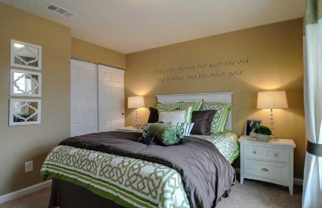 1420 Old Stone Road, Unit 450 Lebanon, TN 37087 - Photo 12 of 20 a bedroom with a bed and lamp