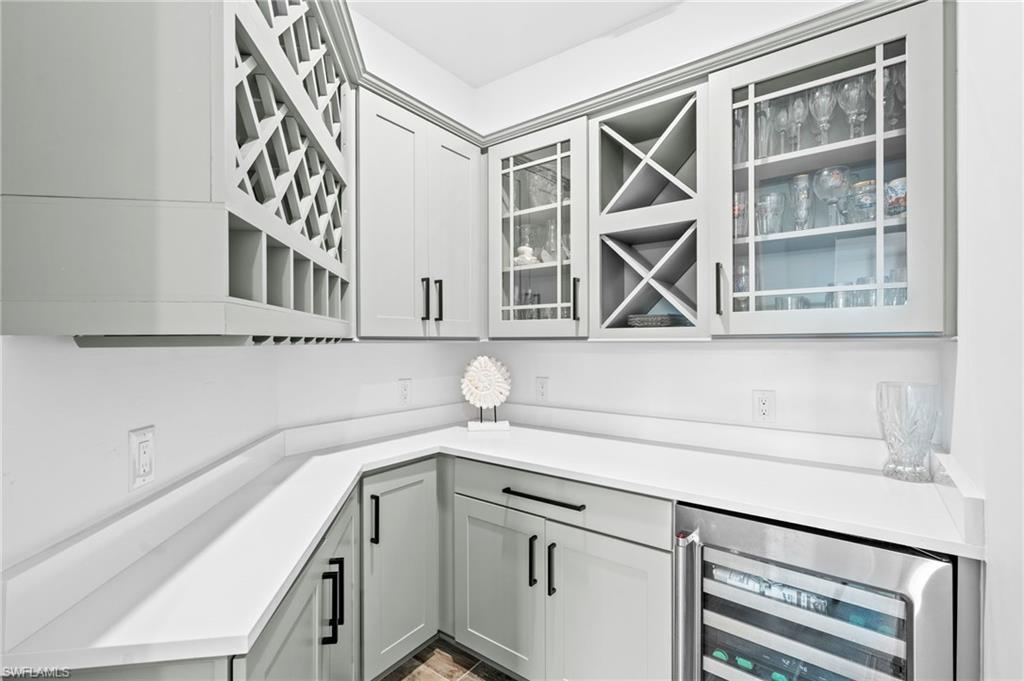 19836 Beverly Park Road Estero, FL 33928 - Photo 14 of 40 a utility room with a sink dryer and washer
