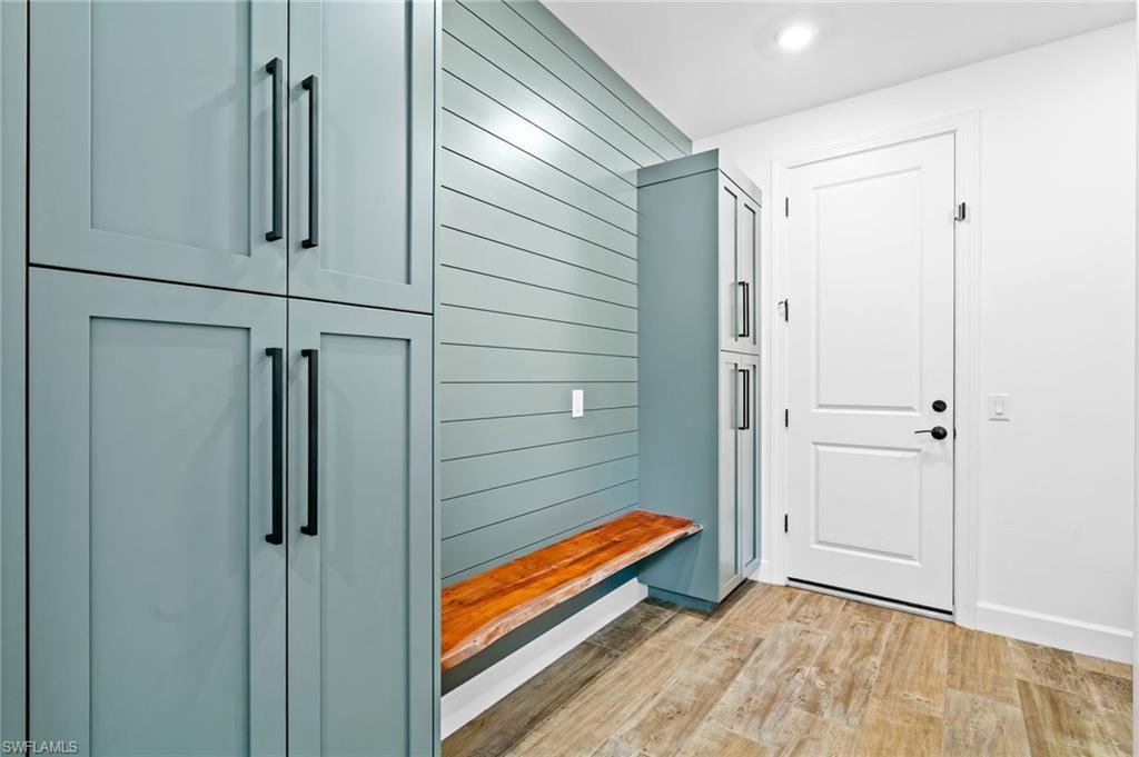 19836 Beverly Park Road Estero, FL 33928 - Photo 16 of 40 a bathroom with a shower and closet