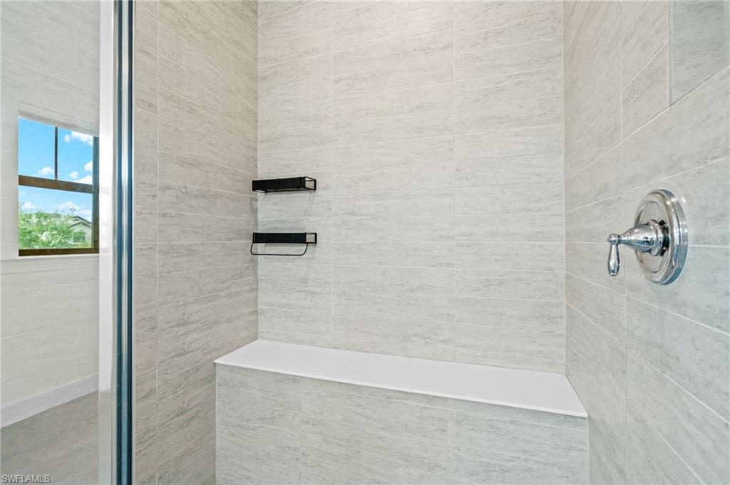 19836 Beverly Park Road Estero, FL 33928 - Photo 21 of 40 a bathroom with a shower