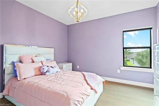 a en suite bathroom with a sink a mirror and a