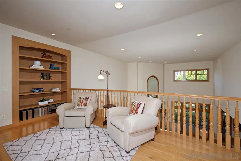 14755 Valleyview Road Poway, CA 92064 - Photo 13 of 24 a living room with furniture and a potted plant