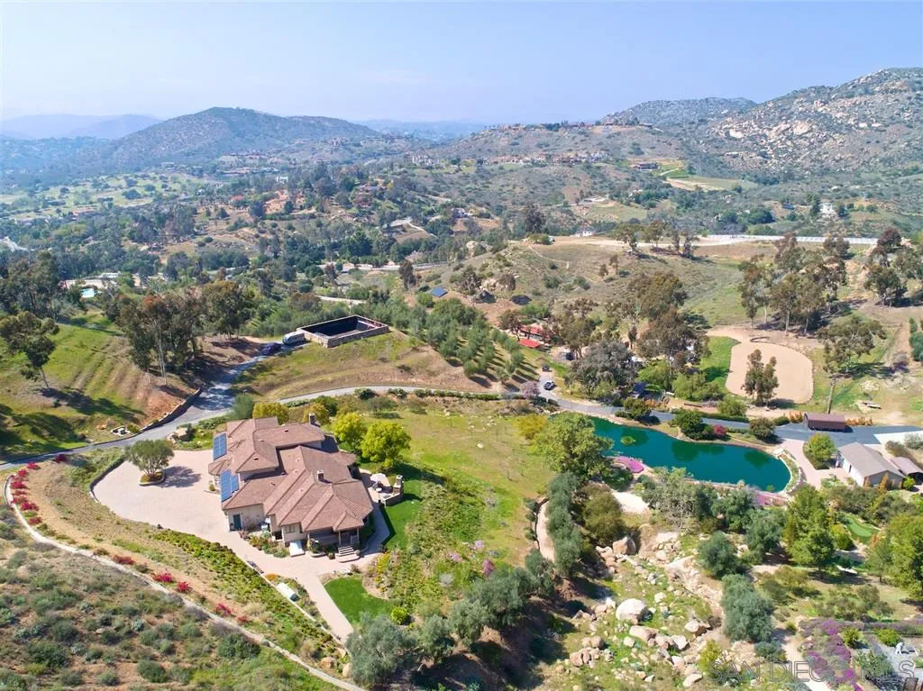 14755 Valleyview Road Poway, CA 92064 - Photo 4 of 24 an aerial view of residential houses with outdoor space and trees