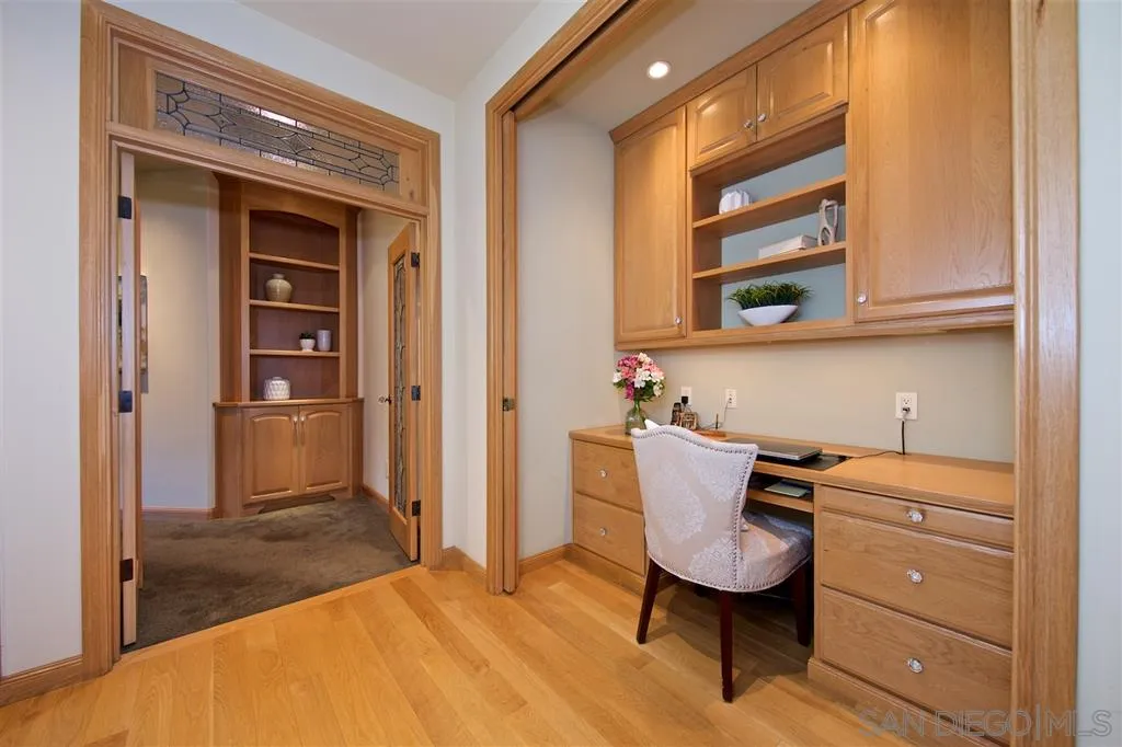 14755 Valleyview Road Poway, CA 92064 - Photo 8 of 24 a room with a chair and a refrigerator