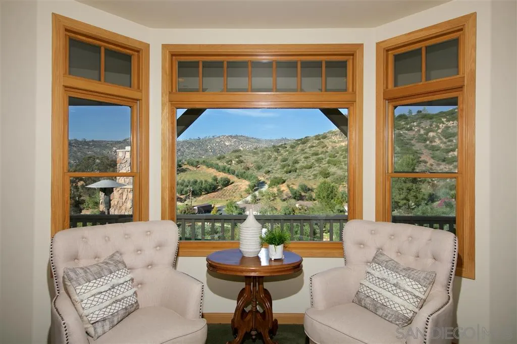 14755 Valleyview Road Poway, CA 92064 - Photo 10 of 24 a living room with furniture and a window