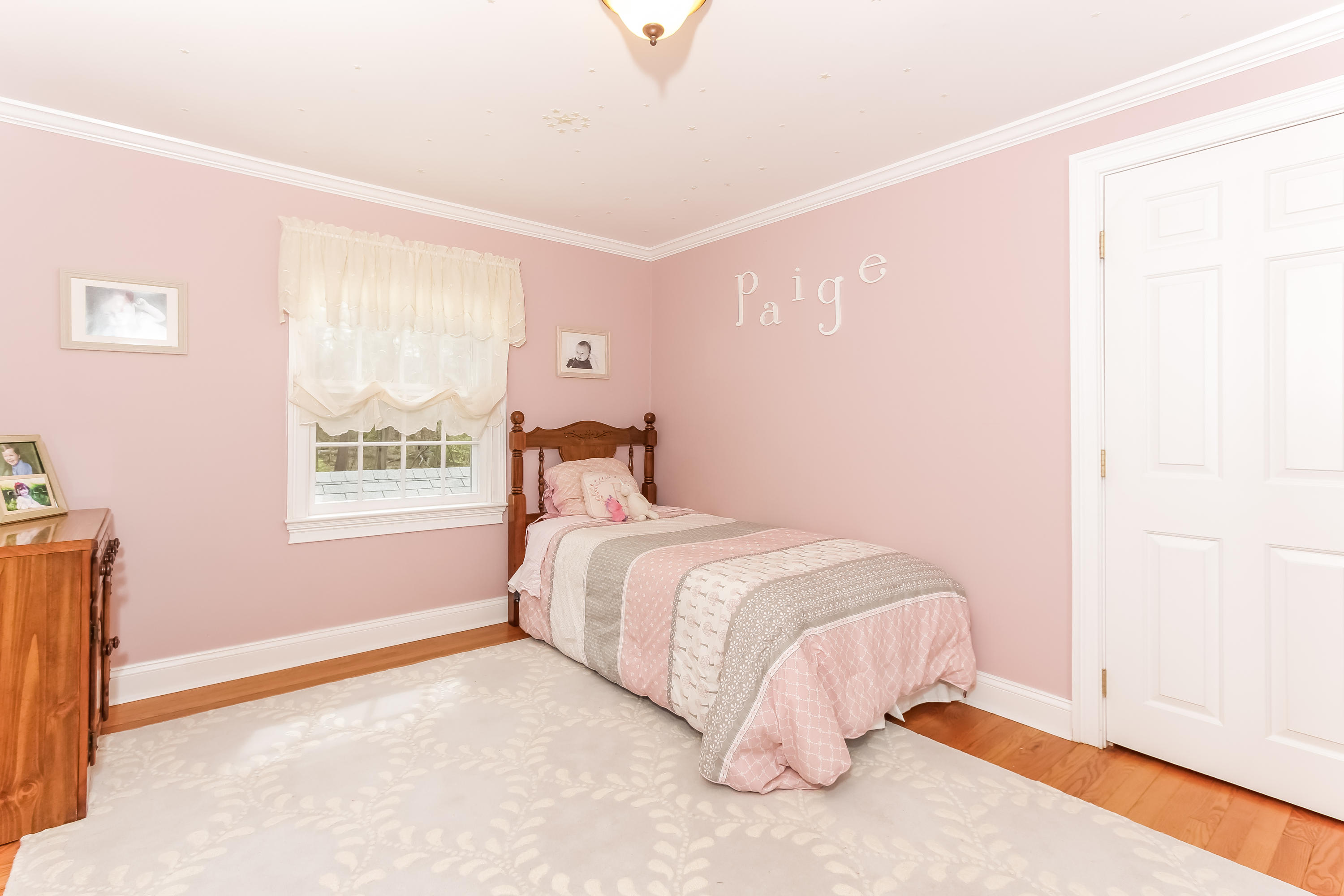 31 Miller Road Darien, CT 06820 - Photo 19 of 29 a bedroom with a bed and a window