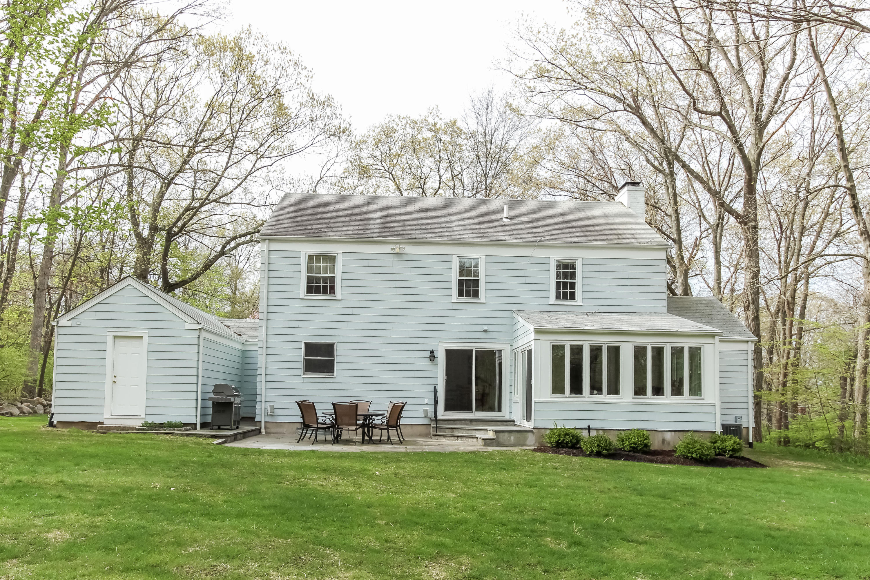 31 Miller Road Darien, CT 06820 - Photo 23 of 29 a front view of a house with a yard