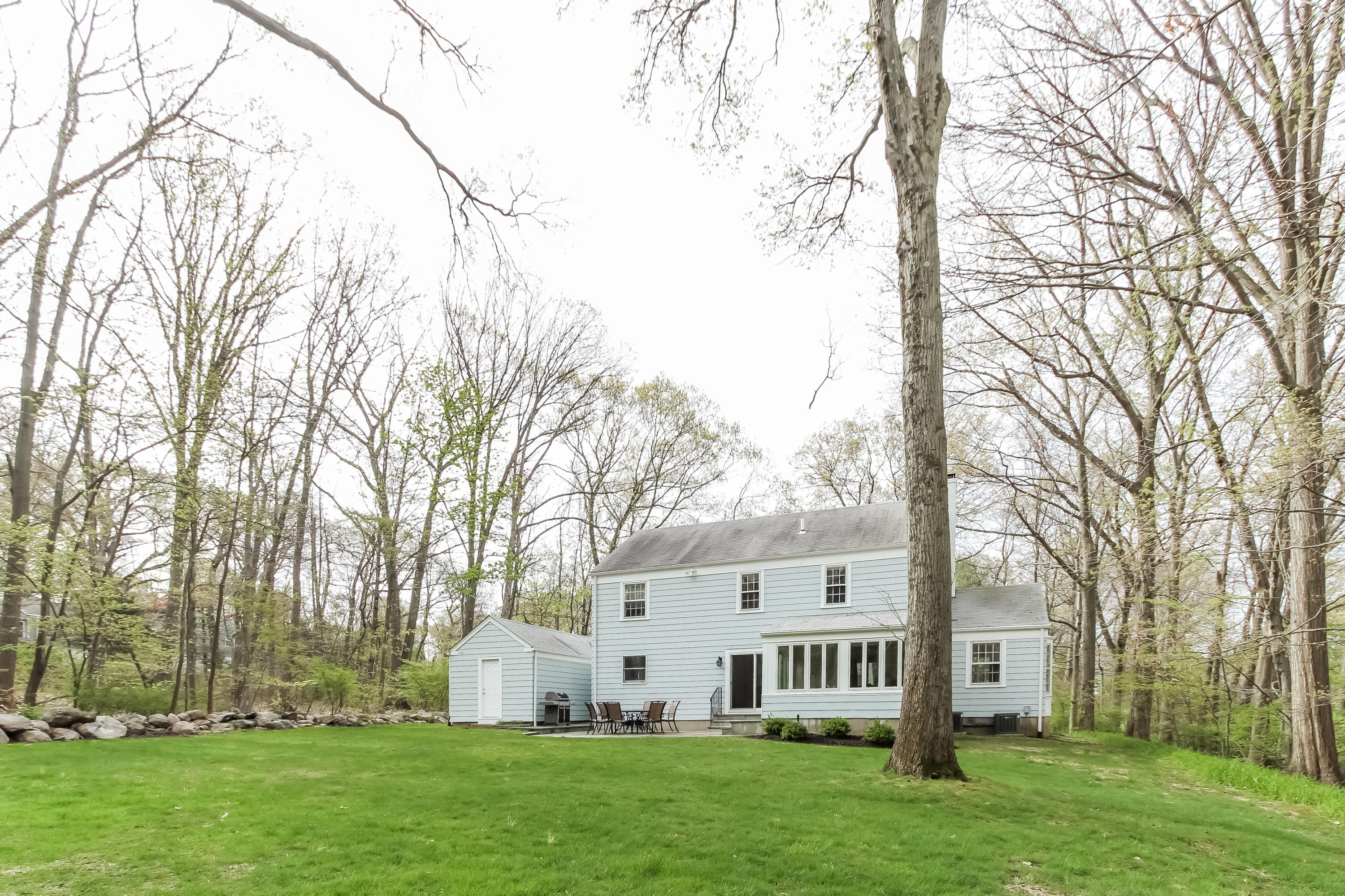 31 Miller Road Darien, CT 06820 - Photo 24 of 29 front view of house with a yard