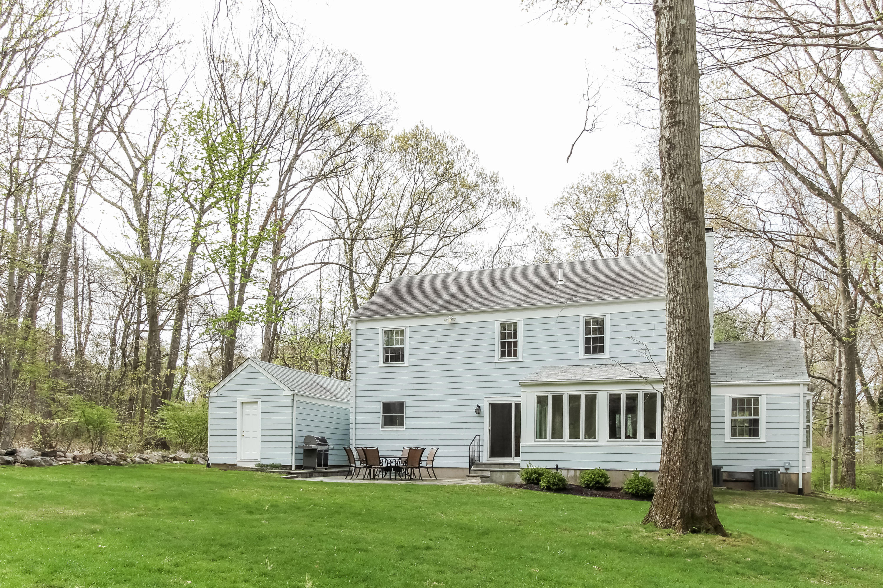 31 Miller Road Darien, CT 06820 - Photo 25 of 29 a view of a house with a yard