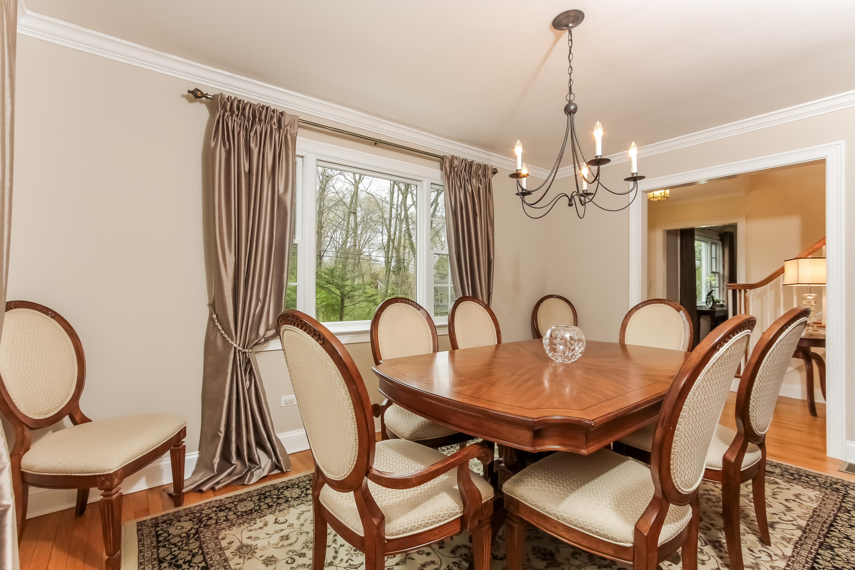 31 Miller Road Darien, CT 06820 - Photo 6 of 29 a dining room with furniture a chandelier and wooden floor