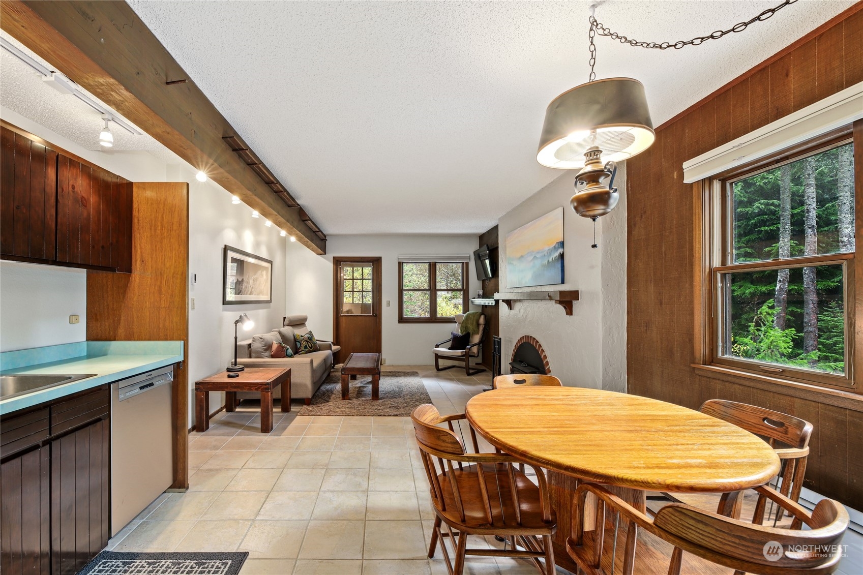 17700 Alpental Access Road, Unit 1006 Snoqualmie Pass, WA 98068 - Photo 4 of 26 a very nice looking dining room with a table and chairs
