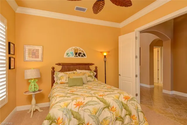 a bedroom with a bed and a cabinets