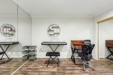 a view of a workspace with furniture