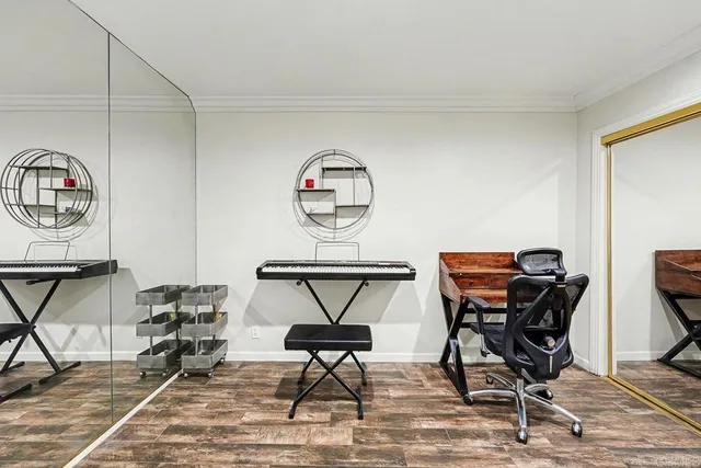 a view of a workspace with furniture