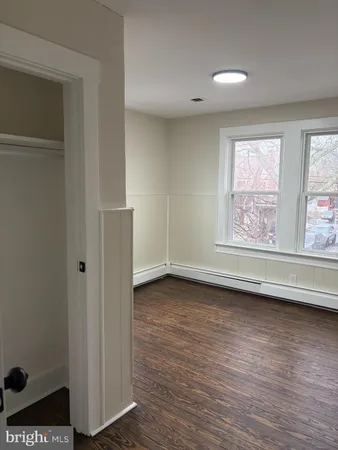 a view of a room that has a window in it