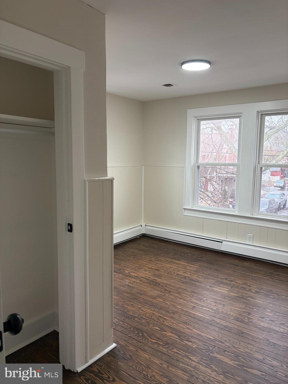 33 Johnson Street Salem, NJ 08079 - Photo 16 of 33 a view of an empty room window and wooden floor