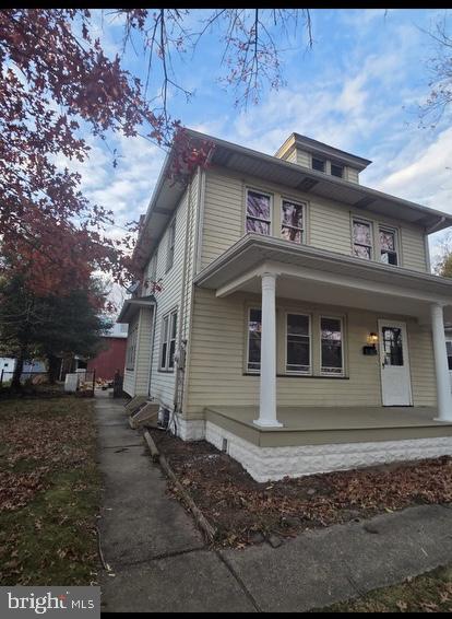 33 Johnson Street Salem, NJ 08079 - Photo 2 of 3 a front view of a house with a yard