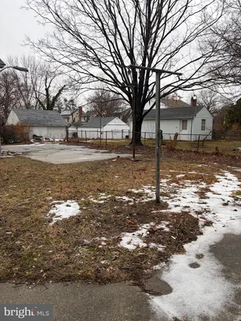 a view of a backyard of the house