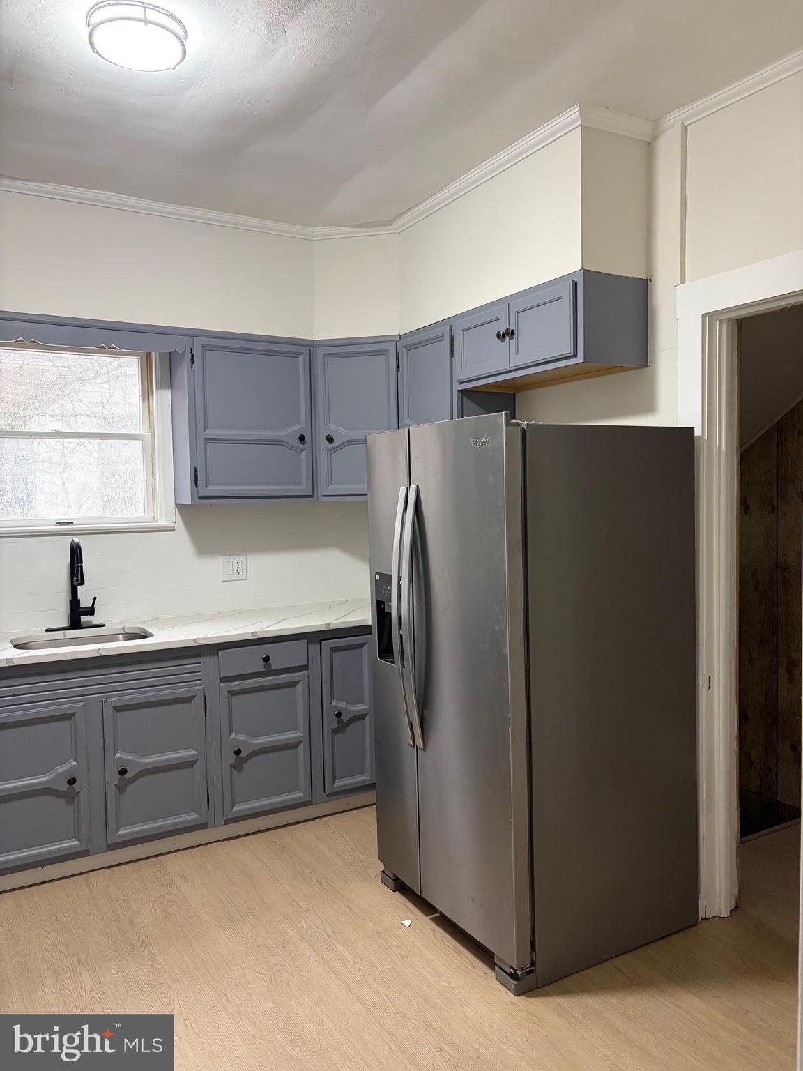 33 Johnson Street Salem, NJ 08079 - Photo 6 of 33 a kitchen with stainless steel appliances granite countertop a refrigerator and a sink