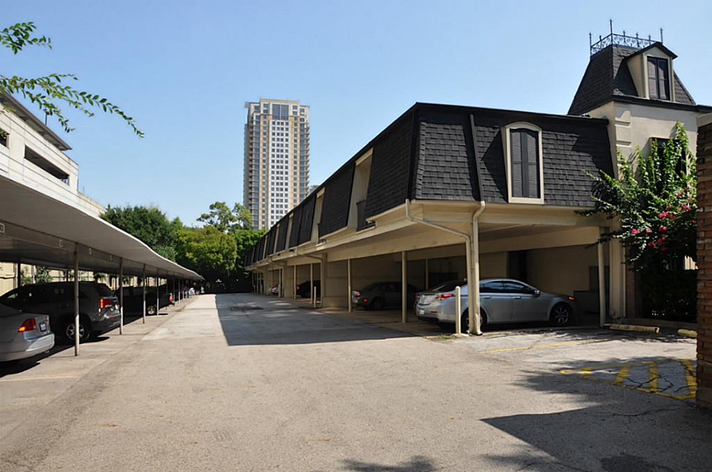 800 Post Oak Boulevard, Unit 72 Houston, TX 77056 - Photo 10 of 11 a front view of a building with street