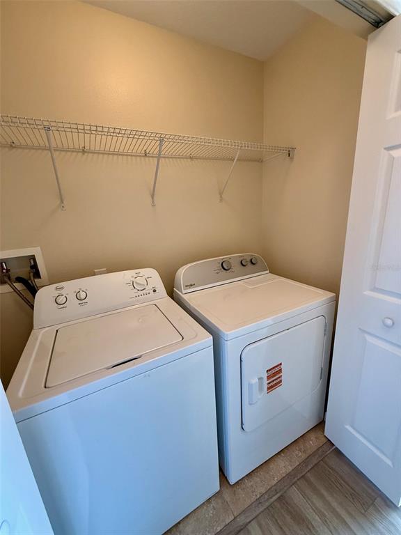 11912 Deer Path Way Orlando, FL 32832 - Photo 16 of 21 a utility room with dryer and washer