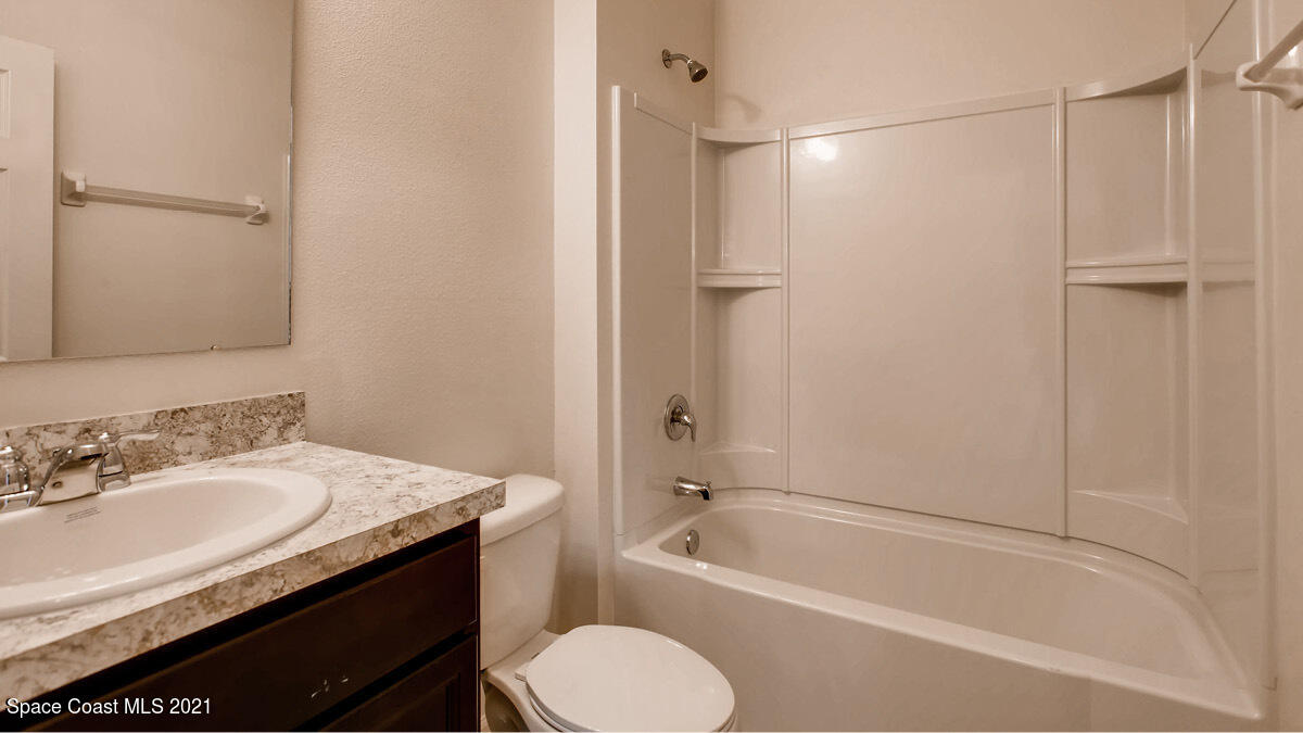 1743 Farmhouse Road Palm Bay, FL 32909 - Photo 9 of 25 HAYDEN MODEL GUEST BATHROOM
