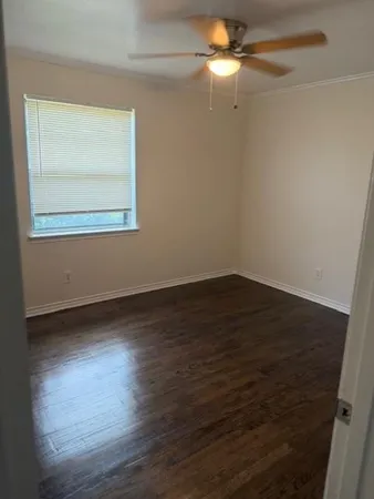 a picture of a park with a bench