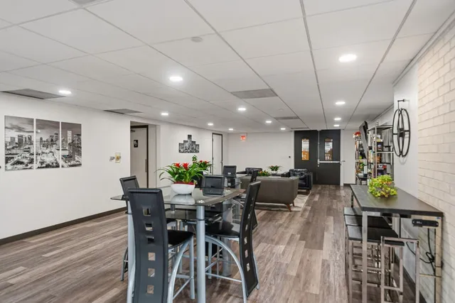 a view of a dining room with furniture