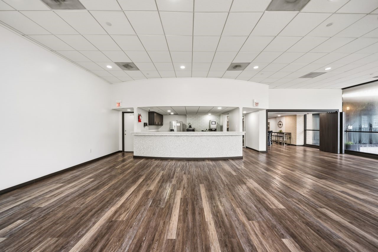 2016 Main Street, Unit 701 Houston, TX 77002 - Photo 33 of 43 a view of an empty room with wooden floor