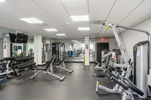 a view of parking garage with cars