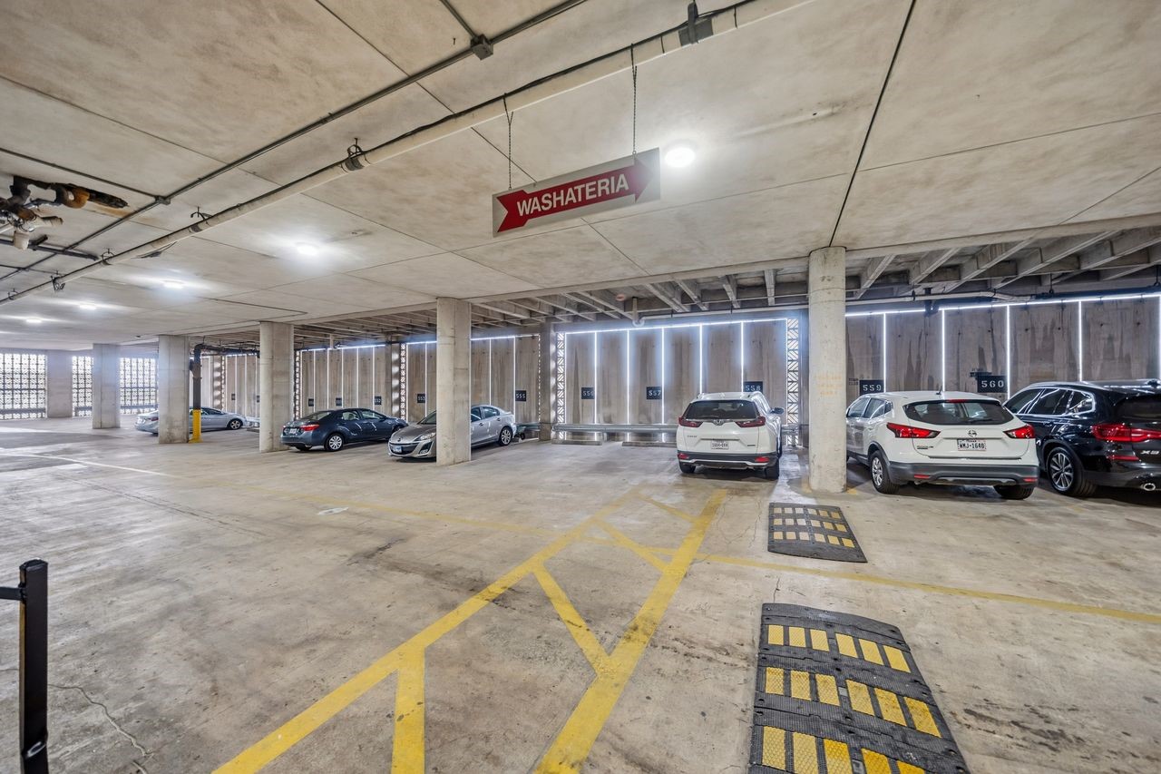 2016 Main Street, Unit 701 Houston, TX 77002 - Photo 37 of 43 a view of parking garage with cars