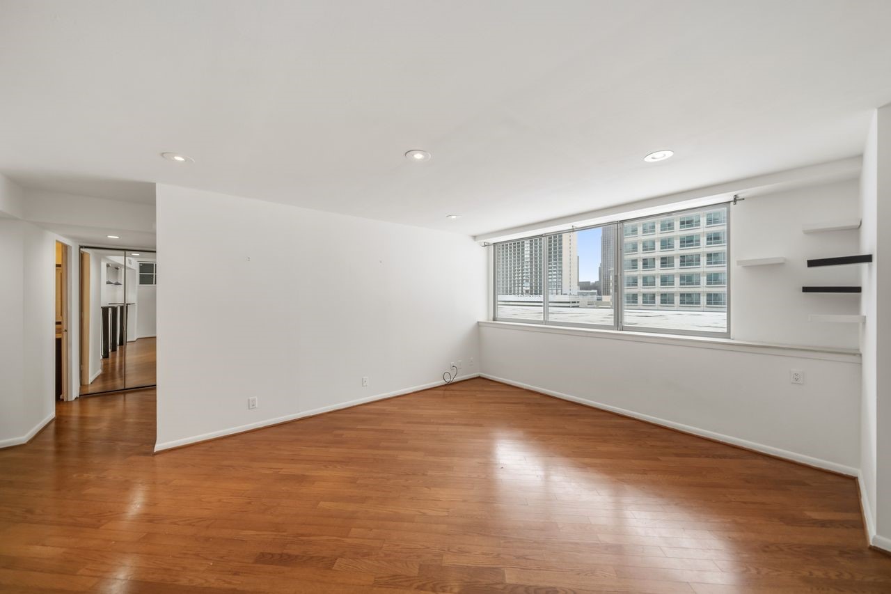 2016 Main Street, Unit 701 Houston, TX 77002 - Photo 4 of 43 a view of an empty room with a window