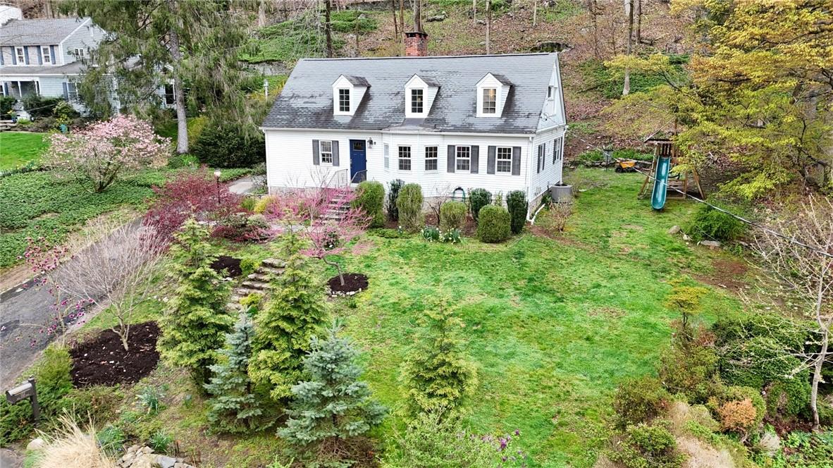 a view of a big yard with plants and garden